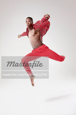 Young dancer in mid air