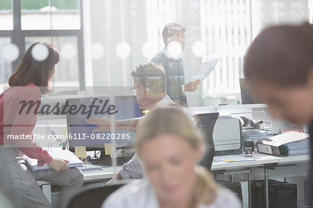 Business people working at computer in office