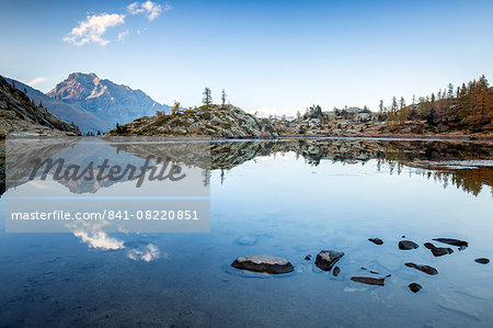 Mountain peaks reflected in Lac Blanc, Champdepraz, Natural Park of Mont Avic, Aosta Valley, Graian Alps, Italy, Europe