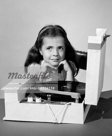 1960s SMILING JUVENILE GIRL LISTENING TO RECORD PLAYER 33RPM VINYL RECORD 1960s SMILING JUVENILE GIRL LISTENING TO RECORD PLAYER 33RPM VINYL RECORD