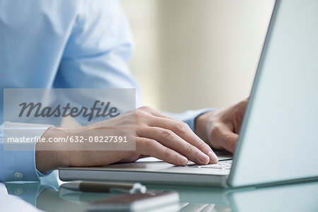 Man using laptop computer