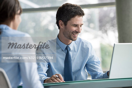 Financial advisor meeting with prospective customer Financial advisor meeting with prospective customer