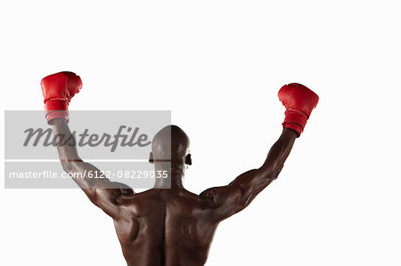 Boxer cheering with fists in air