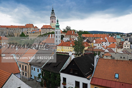 Overview of rooftops with St Jost Church tower and Cesky Krumlov Castle tower, Cesky Krumlov, Czech Republic.