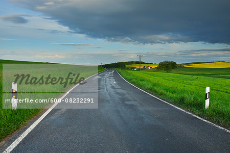 Rural Road in Spring, Reichartshausen, Amorbach, Odenwald, Bavaria, Germany Rural Road in Spring, Reichartshausen, Amorbach, Odenwald, Bavaria, Germany