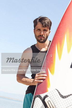 Male surfer, portrait