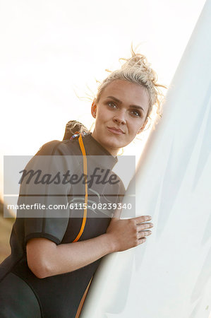 Portrait of female surfer