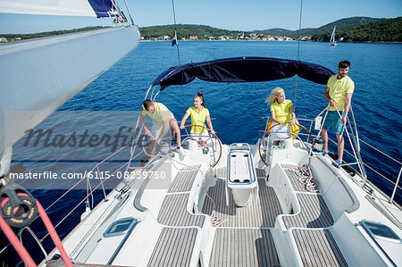 Group of friends together on sailboat, Adriatic Sea
