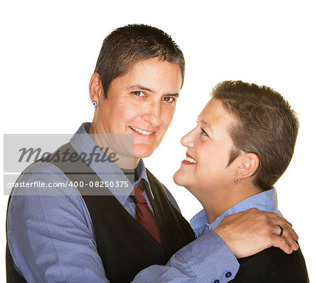 Cheerful lesbian couple embracing over isolated background