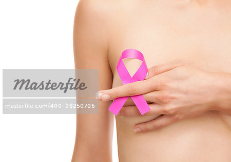 Woman with a pink breast cancer awareness ribbon