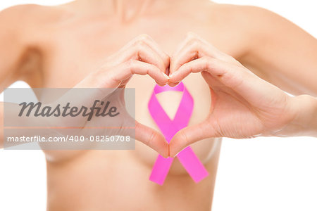 Woman with a pink breast cancer awareness ribbon
