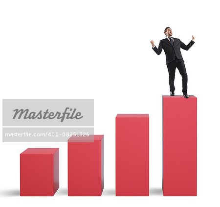 Successful businessman on the top of a statistic bar