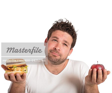 Man choosing between healthy food and unhealthy