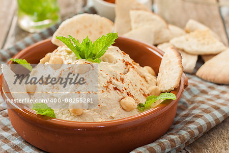 Fresh lebanese hummus for dip with pita bread