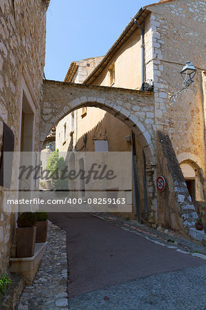narrow old town street of Provence at  summer day, France