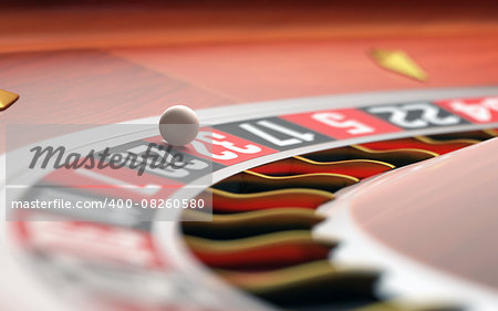 Playing roulette in the casino. Depth of field with focus on the ball.