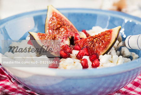 Breakfast with cottage cheese, figs, pomegranate and honey