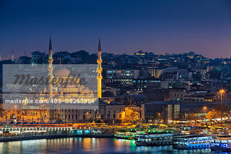 Image of Istanbul with Yeni Cami Mosque during twilight blue hour.