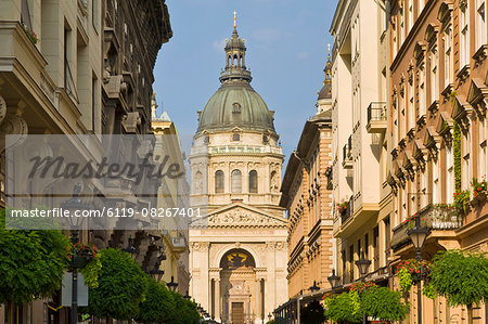 The neo-renaissance dome of St. Stephen's Basilica, shops and buildings of the Zrinyi Utca, central Budapest, Hungary, Europe
