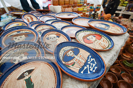 Skeleton pattern on ceramics for sale in the market during Day of the Dead festival, Patzcuaro, Michoacan state, Mexico, North America