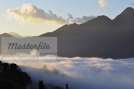 Hoang Lien Mountains and morning fog in Sapa Valley, Sapa, Vietnam, Indochina, Southeast Asia, Asia