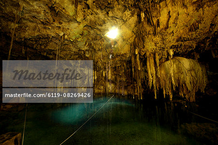 Cenote Dzitnup, underground sinkholes which has only one natural source of light, Yucatan, Mexico, North America