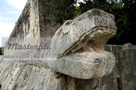 Massive stone carving of snake head, Chichen Itza, UNESCO World Heritage Site, Yucatan, Mexico, North America