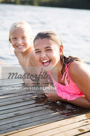 Laughing girls on jetty