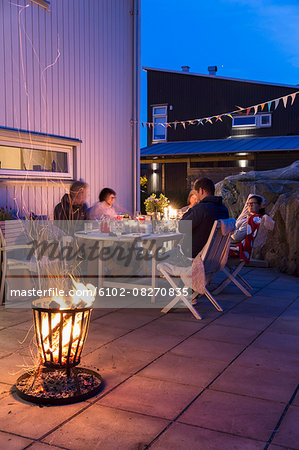 Family at table on backyard