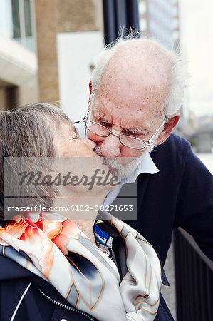 Portrait of senior couple kissing