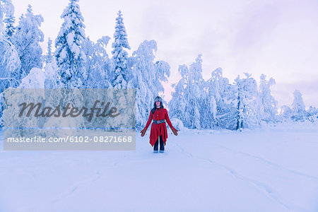 Woman in winter landscape