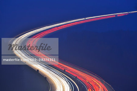 Light Trails on Highway A3 at Night, Haseltal, Rohrbrunn, Spessart, Bavaria, Germany Light Trails on Highway A3 at Night, Haseltal, Rohrbrunn, Spessart, Bavaria, Germany