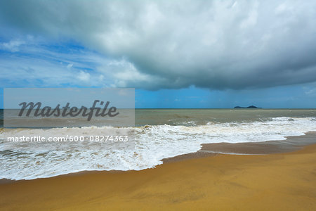 Sandy Beach with Storm Clouds in Summer, Captain Cook Highway, Queensland, Australia