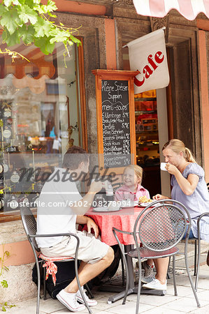 Family in outdoor cafe