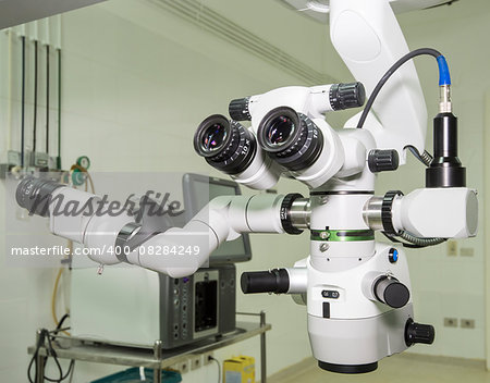 Closeup of a hi-tech microscope examination equipment in hospital operating room