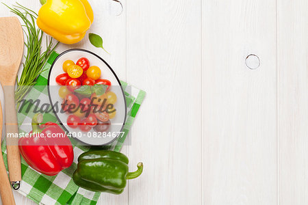 Fresh colorful vegetables on white wooden table. Top view with copy space