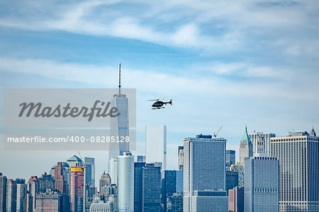 An image of a helicopter over new york