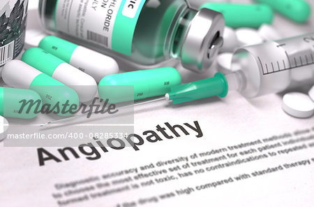 Angiopathy - Printed Diagnosis with Mint Green Pills, Injections and Syringe. Medical Concept with Selective Focus.