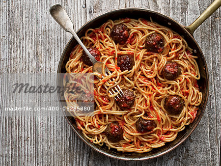 close up of rustic american italian meatball spaghetti
