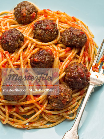 close up of rustic american italian meatball spaghetti
