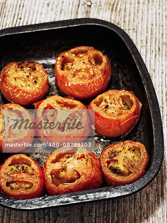 close up of rustic roasted tomatoes