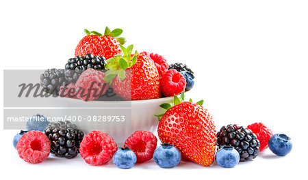 Big Pile of Fresh Berries in the White Bowl on the White Background