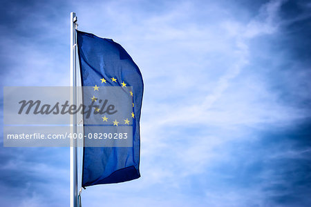 Image of the flag of Europe with blue sky