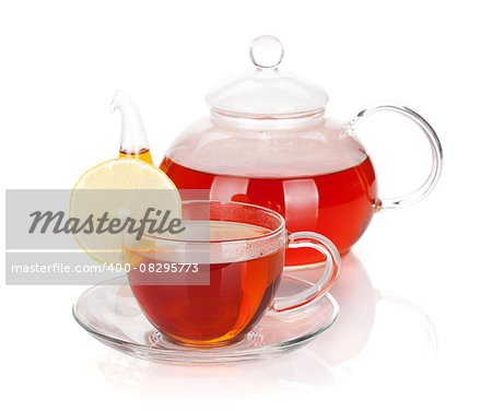Glass teapot and cup of black tea with lemon slice. Isolated on white background