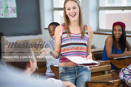 Female student making presentation to class