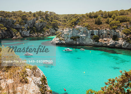 High angle view of yachts anchored at Cala Macarella, Menorca, Spain