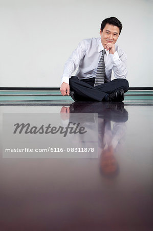 Businessman in Conference Room