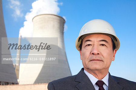 Businessman at power plant