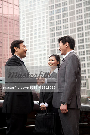 Three businesspeople outdoors