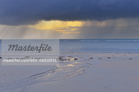 Sandy Beach with Tideway Watercourse and Storm Clouds in Morning, Daintree Rainforest, Cape Tribulation, Queensland, Australia